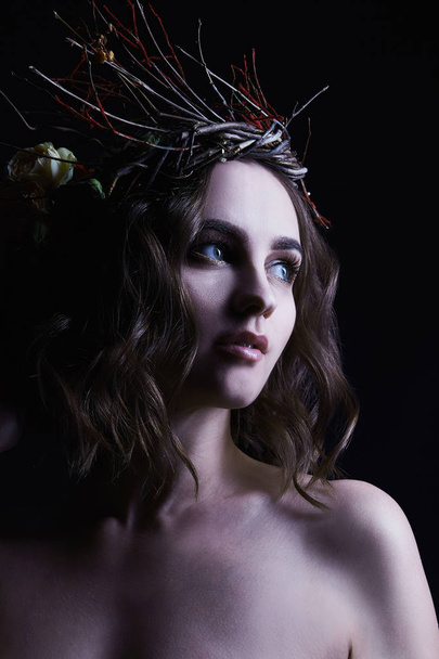 Beautiful girl with a wreath on her head. winter symbol portrait of young woman - Φωτογραφία, εικόνα