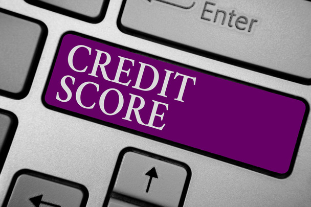 Writing note showing Credit Score. Business photo showcasing Represent the creditworthiness of an individual Lenders rating Keyboard purple key Intention computer computing reflection document - Photo, Image