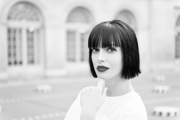 Woman with brunette hair and red lips makeup face in Paris, France - Valokuva, kuva
