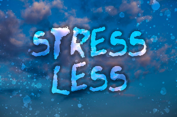 Word writing text Stress Less. Business concept for Stay away from problems Go out Unwind Meditate Indulge Oneself Cloudy bright blue sky sunset landscape relaxing time inspirational view - Photo, Image