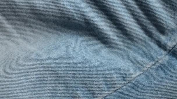 Ragged jeans. The hole on the leaky jeans. Fabric background. - Footage, Video