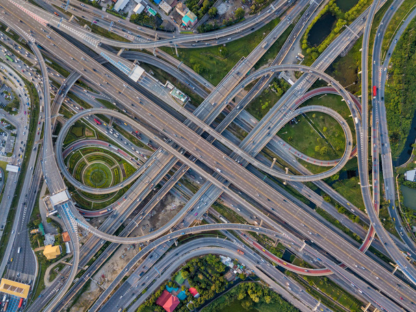 Top view of Highway road junctions. The Intersecting freeway road overpass the eastern outer ring road of Bangkok, Thailand. - Photo, Image