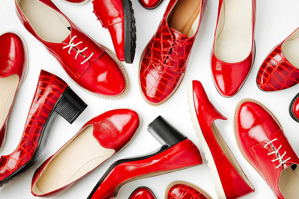 Stylish female autumn shoes in red color on white background - Φωτογραφία, εικόνα