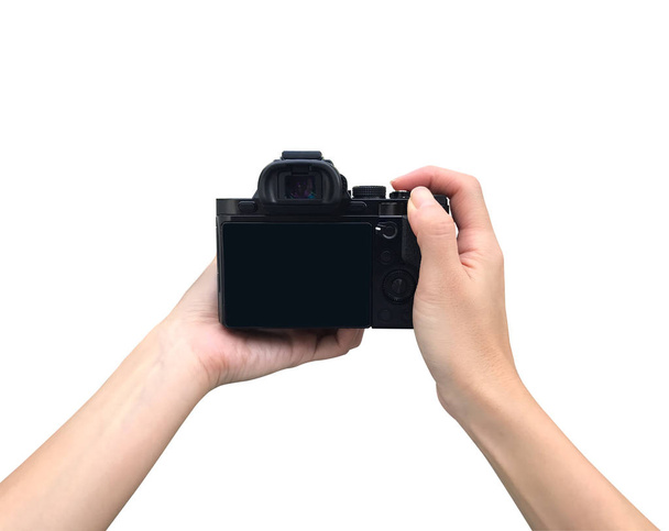 Holding camera with isolated background  - Valokuva, kuva
