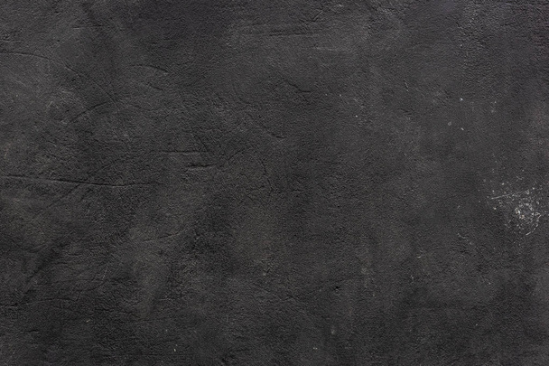schwarze Grunge-Zementwand als Hintergrund. - Foto, Bild