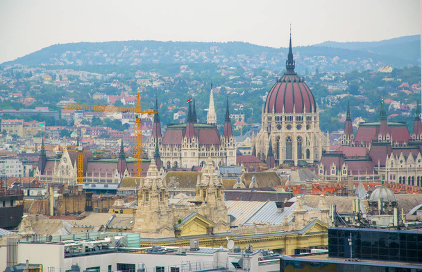 Panoramic view of Budapest city over Pest, Parliament Building and old roofs at daylight, Budapest, Hungary - Fotoğraf, Görsel