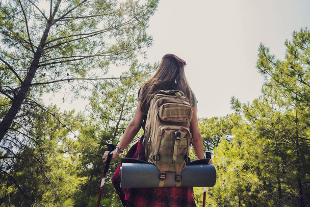 Trekking with backpack in the forest - Photo, Image