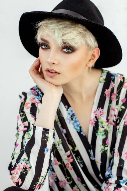 Beauty portrait of fashion blond model in a hat - Zdjęcie, obraz