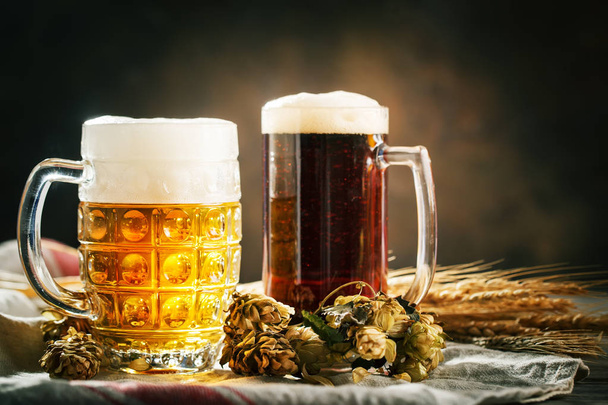 Beer in glasses on a dark background. Oktoberfest. Beer festival. Selective focus. Background with copy space. - Foto, Imagem