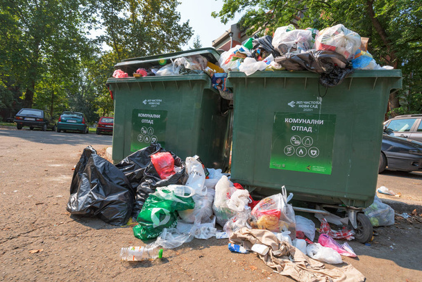 NOVI SAD, SERBIA - AUGUST 18, 2018: Municipal solid waste or communal garbage is overflowing containers in Novi Sad during weekends, illustrative editorial - Foto, immagini