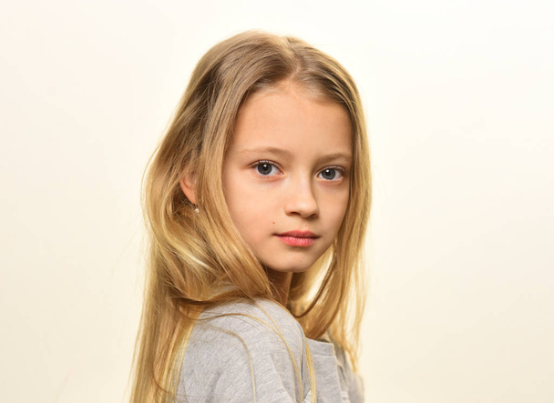 small blonde. small blonde girl isolated on white. small girl with long blonde hair. small blonde with pretty face. perfect girl - Zdjęcie, obraz