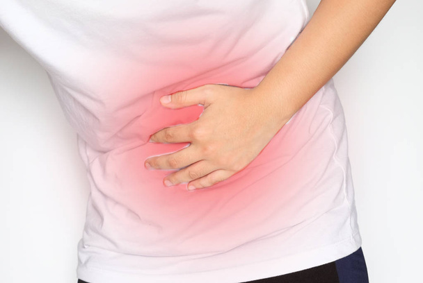 Člověk trpící bolesti břicha na bílém poza - Fotografie, Obrázek