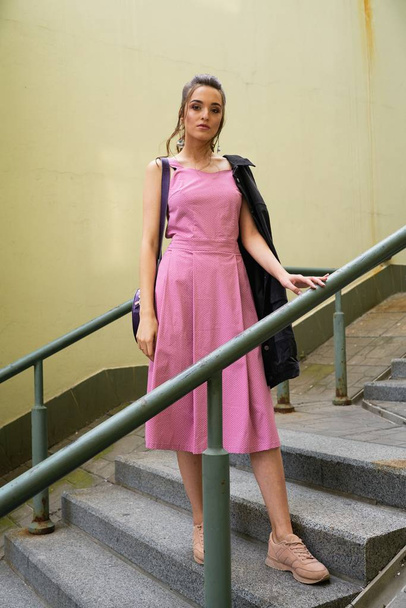 stylish female fashion model posing on the street  - Fotoğraf, Görsel