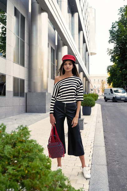 stylish female fashion model posing on the street  - Fotografie, Obrázek