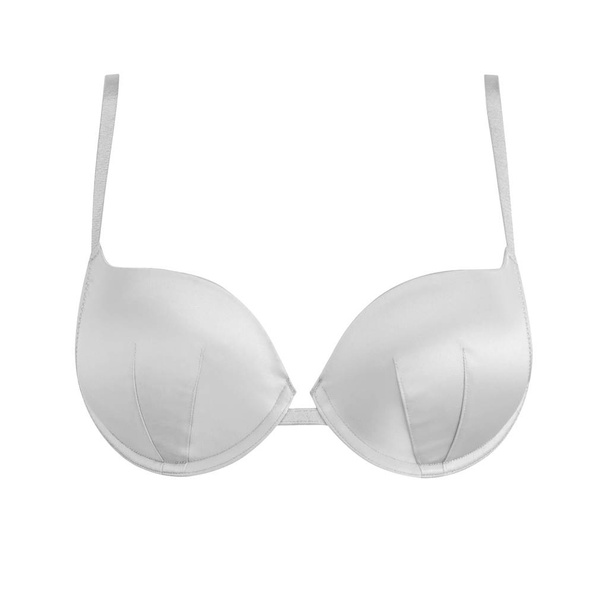 White silk sexy push up brassiere isolated on white background. Women's expensive elegant underwear garment - Фото, зображення