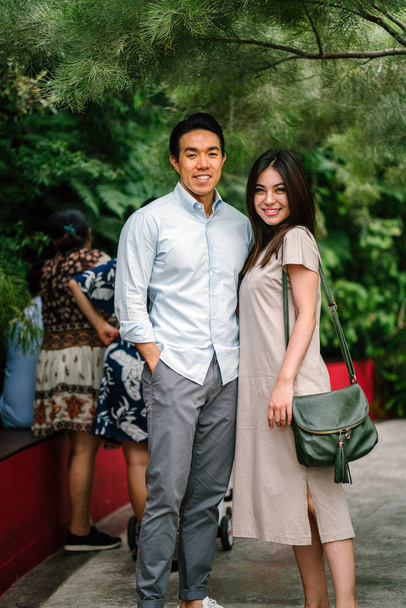 Portrait of young happy asian couple posing  - Foto, Imagem