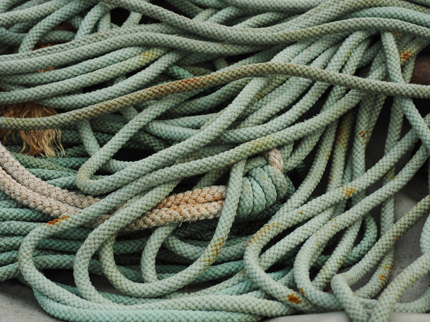 Old used green rope in a harbour, fishing equipment - Foto, Imagem