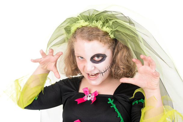 Girl in Halloween costume over a white background - Фото, изображение