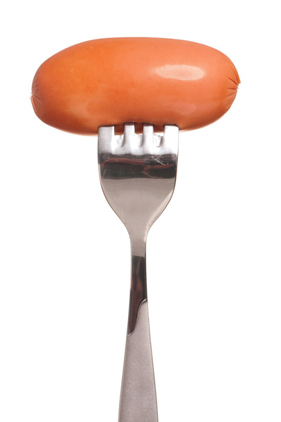 Sausage on fork - Фото, зображення