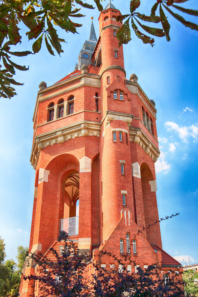 WROCLAW, POLAND - AUGUST 18, 2018: The water tower at Sudecka Street in Wroclaw, 63 meters high, designed by Karl Klimm. Built 1904-1905, situated in Borek, the district of Krzyki, Wroclaw, Poland. - Fotoğraf, Görsel