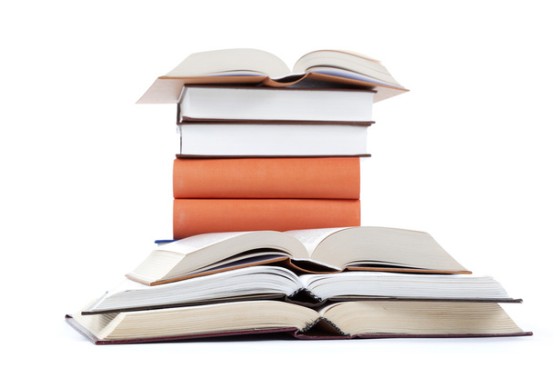 A stack of books on a white background. - Foto, Imagen