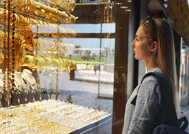 Woman on gold market in Sharjah City, United Arab Emirate - Photo, Image