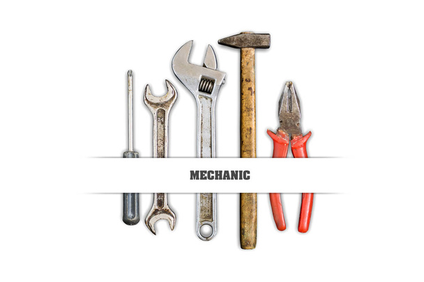 Werkzeuge, Schraubenschlüssel auf weißem Hintergrund. Inschrift, Mechanik. Arbeitsbegriff, Beruf - Foto, Bild