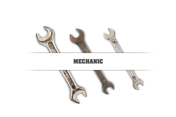 Set di strumenti, chiavi su sfondo bianco. Iscrizione, Meccanico. Concetto di lavoro, professione
 - Foto, immagini