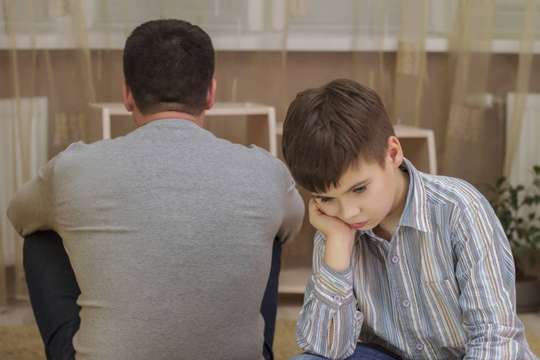 Conflict between father and son, family relations - Valokuva, kuva