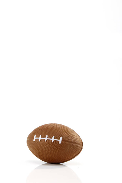 Toy American football white background, close-up - Photo, Image