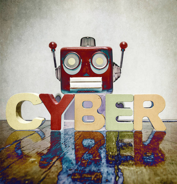 red retro robot head on the word   CYBER on old wooden flor - Photo, Image