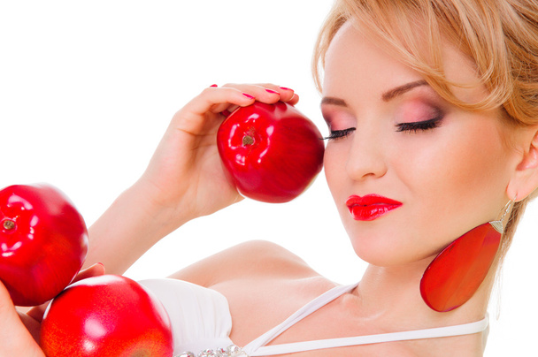woman holding apple - Фото, изображение