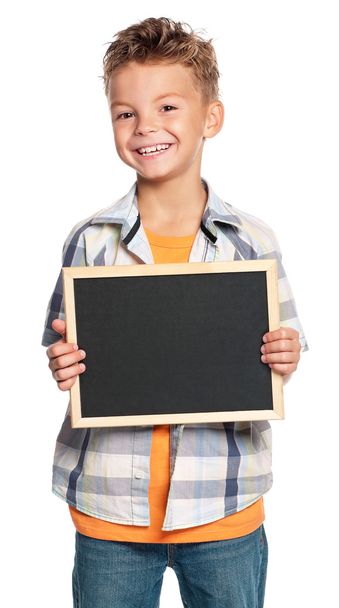 Boy with small blackboard - Foto, afbeelding