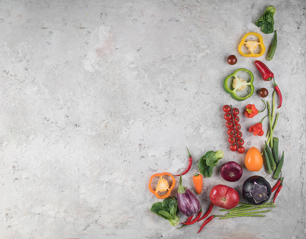 Healthy food background. Concept of Healthy Food, Fresh Vegetables, Nuts and Fruits. On a wooden background. Top view. Copy space. - Photo, Image