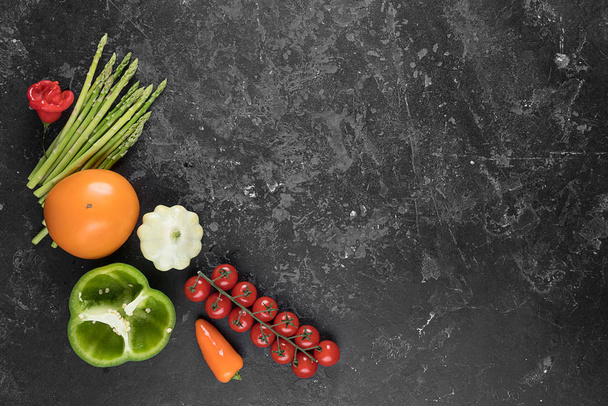 Food background. Fresh farmer vegetables at dark beton table. Space for text. - Фото, зображення