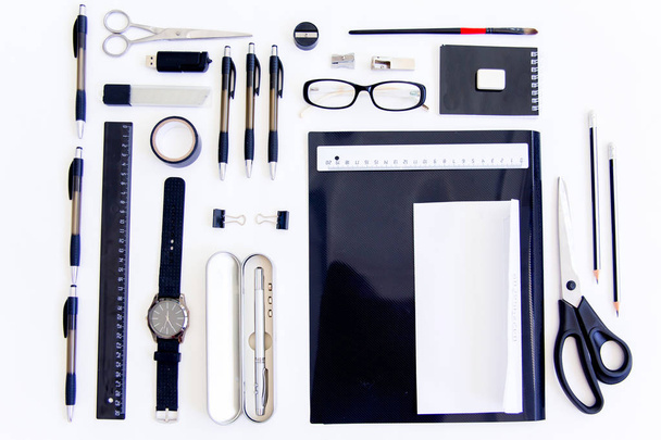 stationery pen scissors notebook on a wooden table - Fotografie, Obrázek