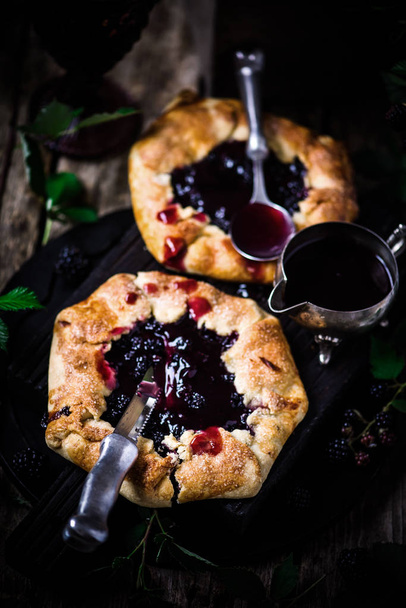Blackberry Galette with Red Wine Sauce.style rustic. selective focus - Photo, Image