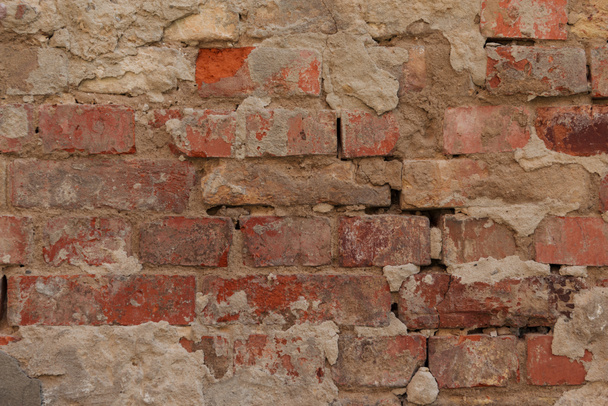 stary pęknięty brązowy ceglany mur teksturowanej tło   - Zdjęcie, obraz
