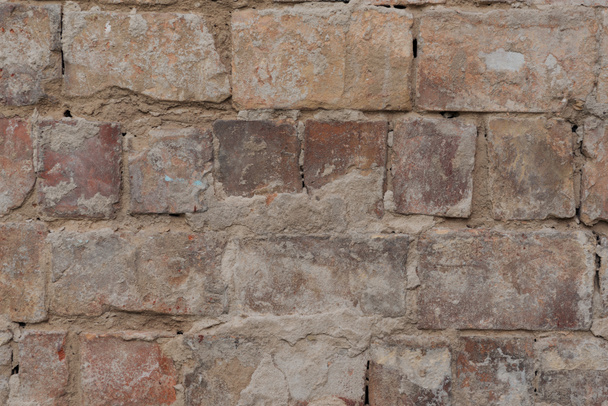 クローズ アップ ビューの古いひびの入ったレンガ壁のテクスチャ背景  - 写真・画像