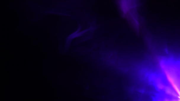 Rays of light in smoke on a black background - Séquence, vidéo