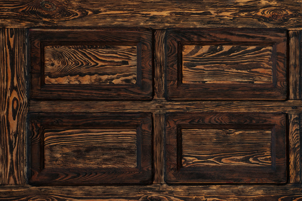 close-up view of dark brown textured wooden background  - Фото, зображення