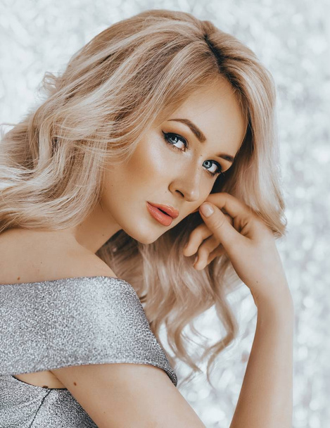 Portrait of beautiful young blonde woman with makeup - Foto, afbeelding