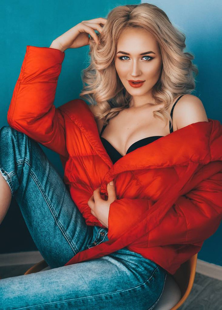 Portrait of beautiful young blonde woman with makeup in fashion clothes - Foto, immagini