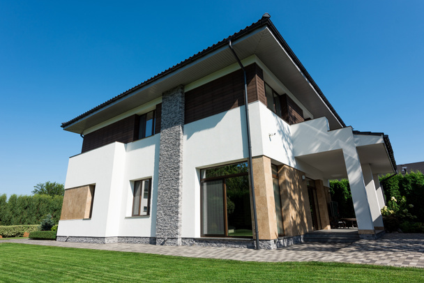 outside view of modern house with green lawn - Photo, Image