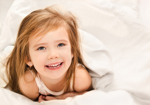 Adorable little girl awaked up - Photo, Image