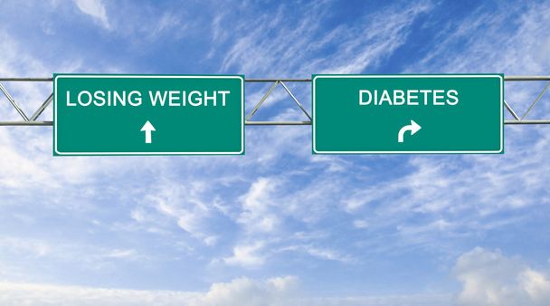Road sign to losing weight and diabetes - Fotoğraf, Görsel