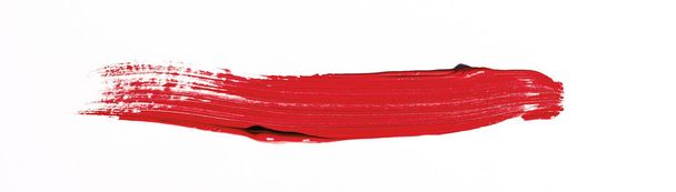 Red brush stroke isolated over white background - Foto, afbeelding