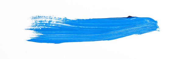 Blue brush stroke isolated over white background - Foto, imagen