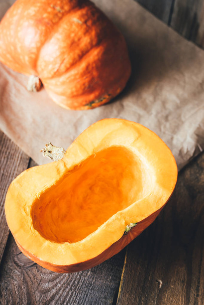 Pumpkin on the wooden background - Foto, immagini