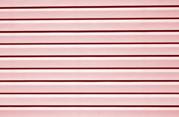 Plastic siding surface in red tone. Abstract background and texture. - Foto, Imagem